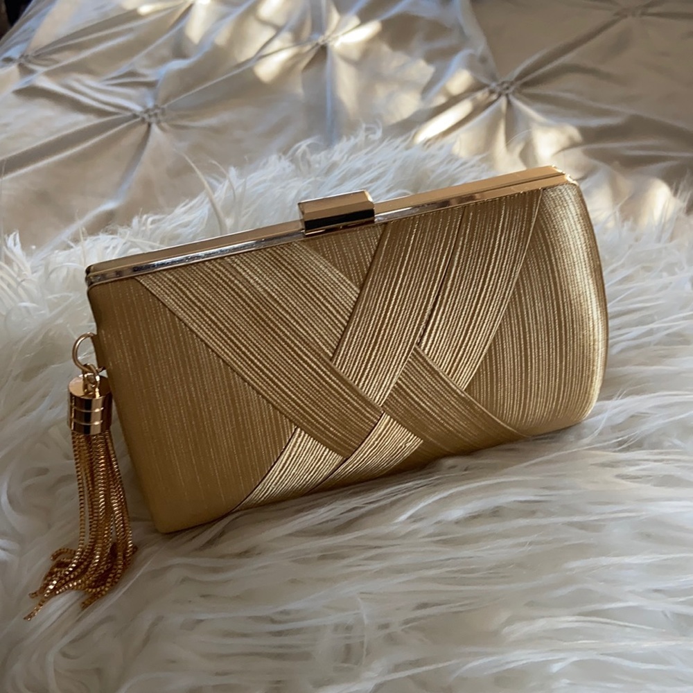 Brand new gold evening clutch